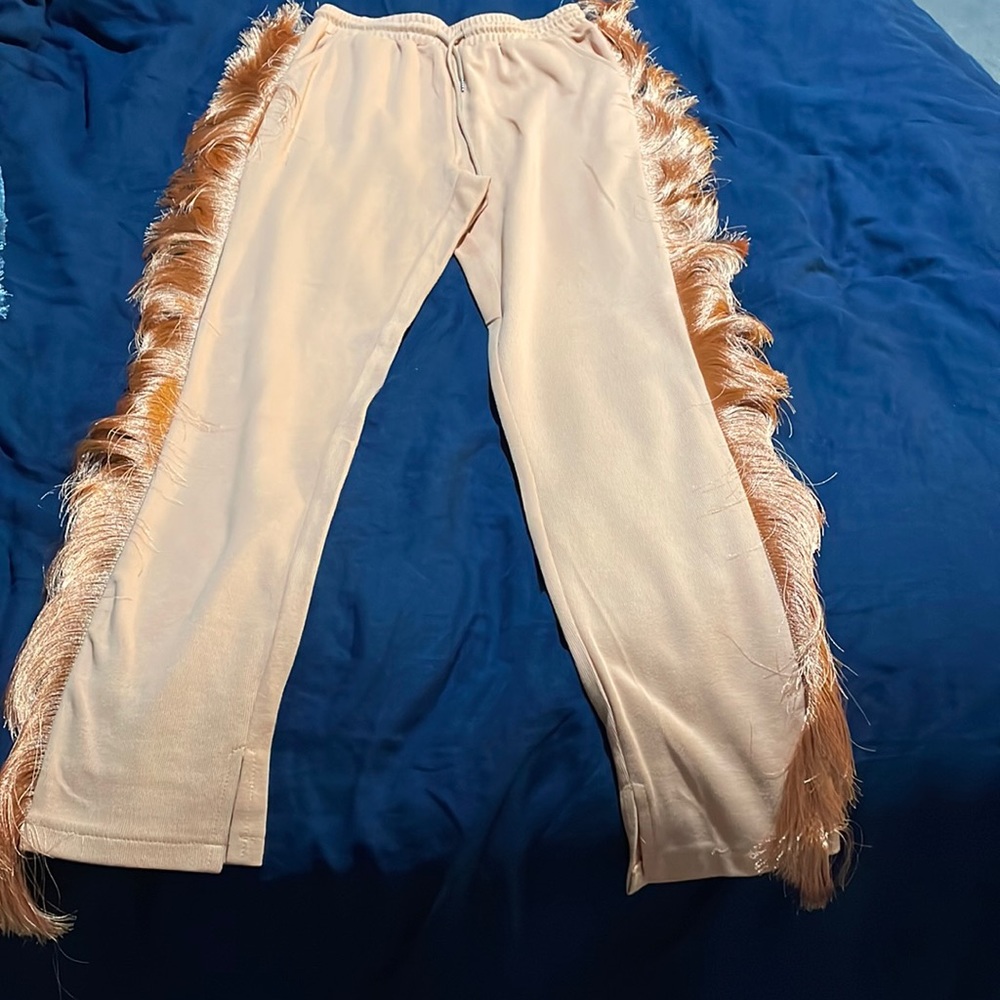 Orange fringe pants